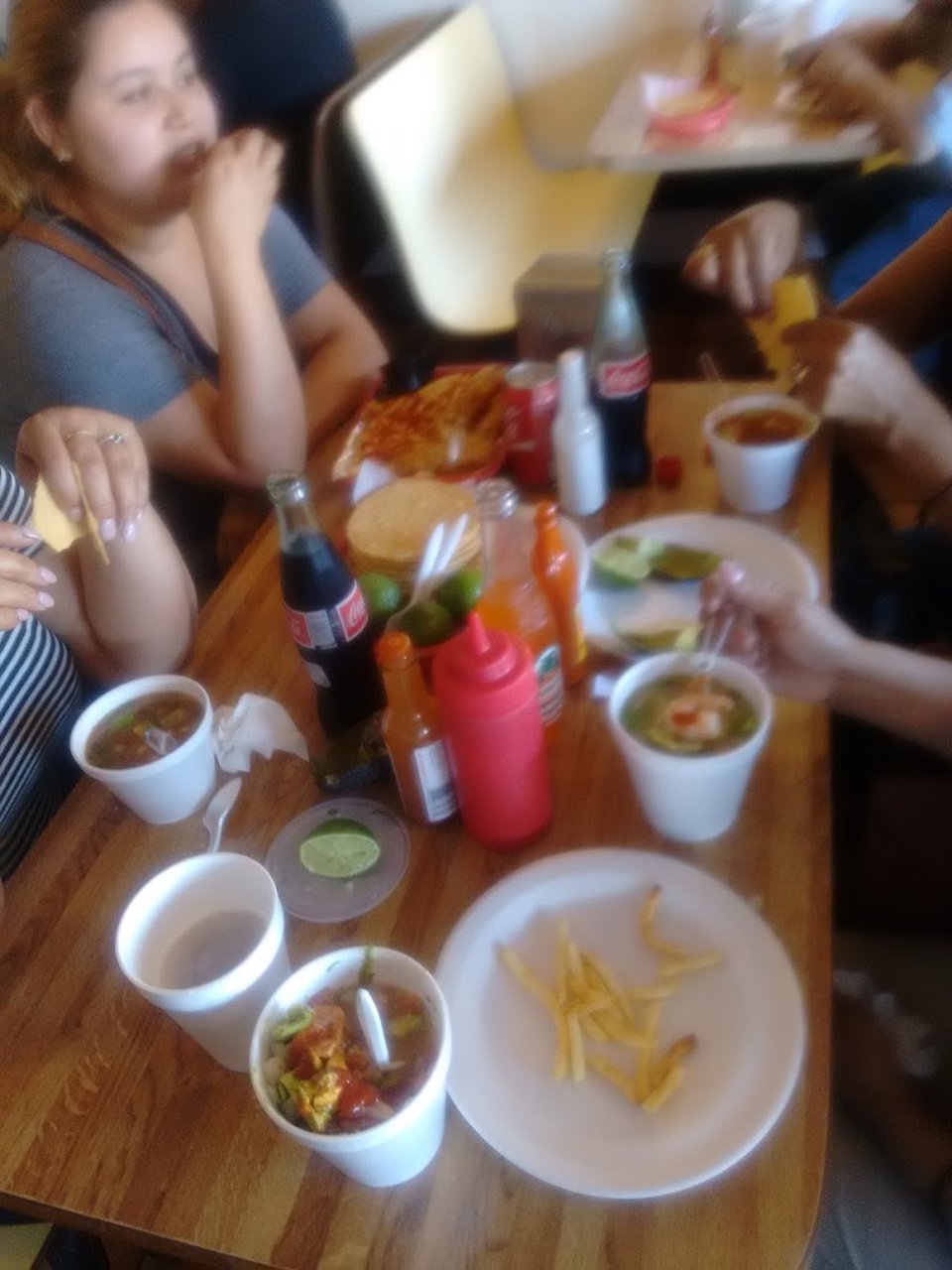 Fish tacos and tostadas pictured together.
